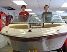 Adam (right) and Jacob Cooper will begin earning their Young Boater Safety Certificates at the February 10-14, 2010 Central New York Boat Show. The training is being offered for hearing and, for the first time at the show, for deaf youth.