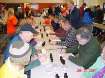 An always popular St. Lawrence County Maple Expo workshop helps producers compare maple flavors affected by different production factors. Participants enjoy taste testing as they learn. Photo: Steve VanderMark, CCE St. Lawrence County