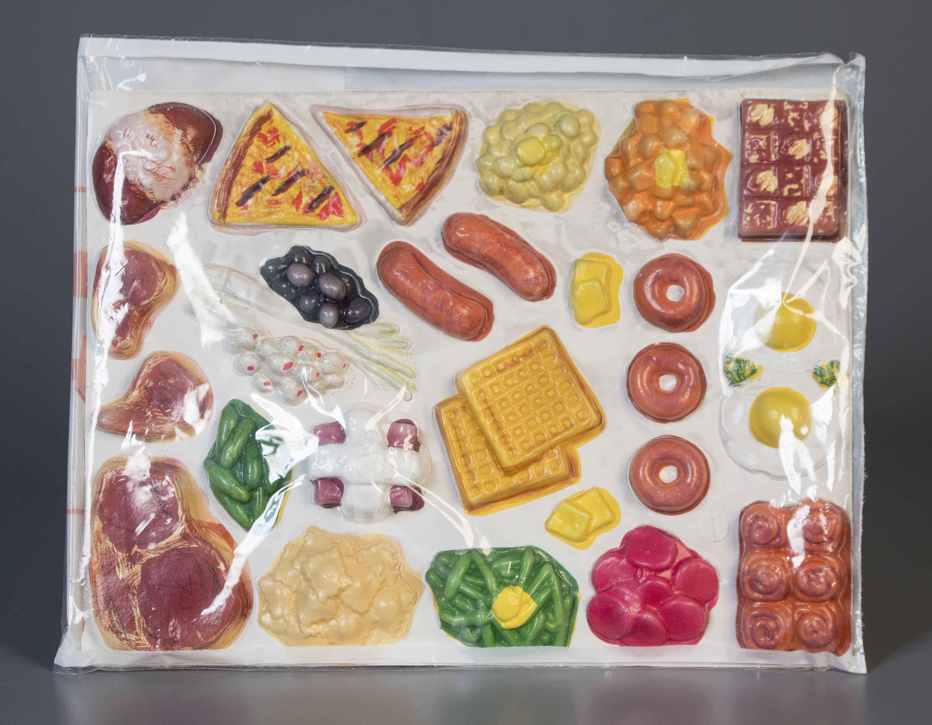 play food wrapped in plastic