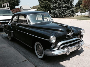 Antique car brought in for new upholstery, Kentland