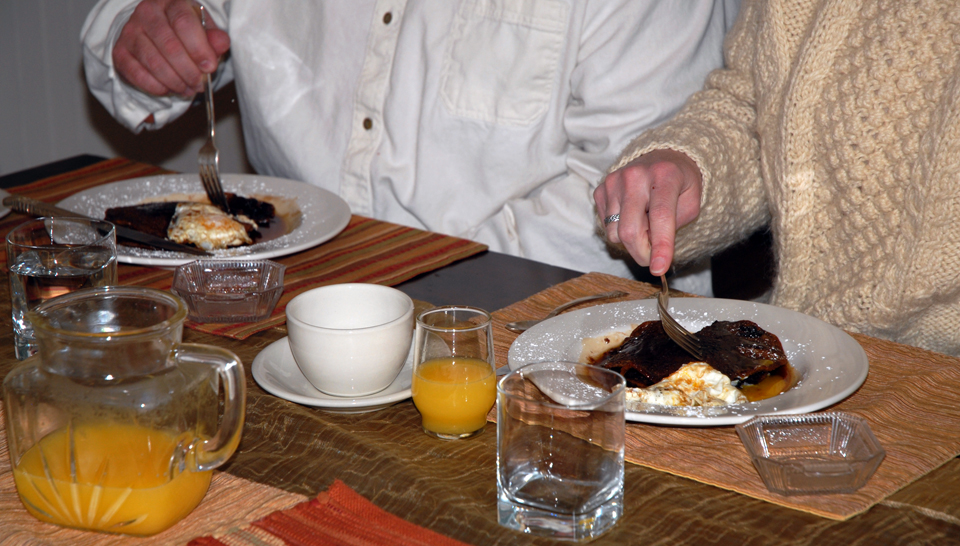 Couple Enjoying Beer Batter Pancakes with Ganache