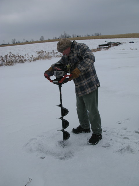 Randy with auger in the Finger Lakes