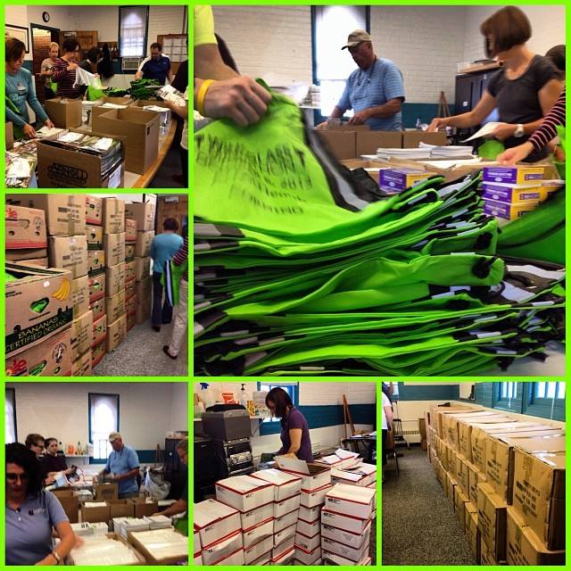 Volunteers hard at work stuffing bags of goodies for the runners! Volunteers hard at work stuffing bags of goodies for the runners!