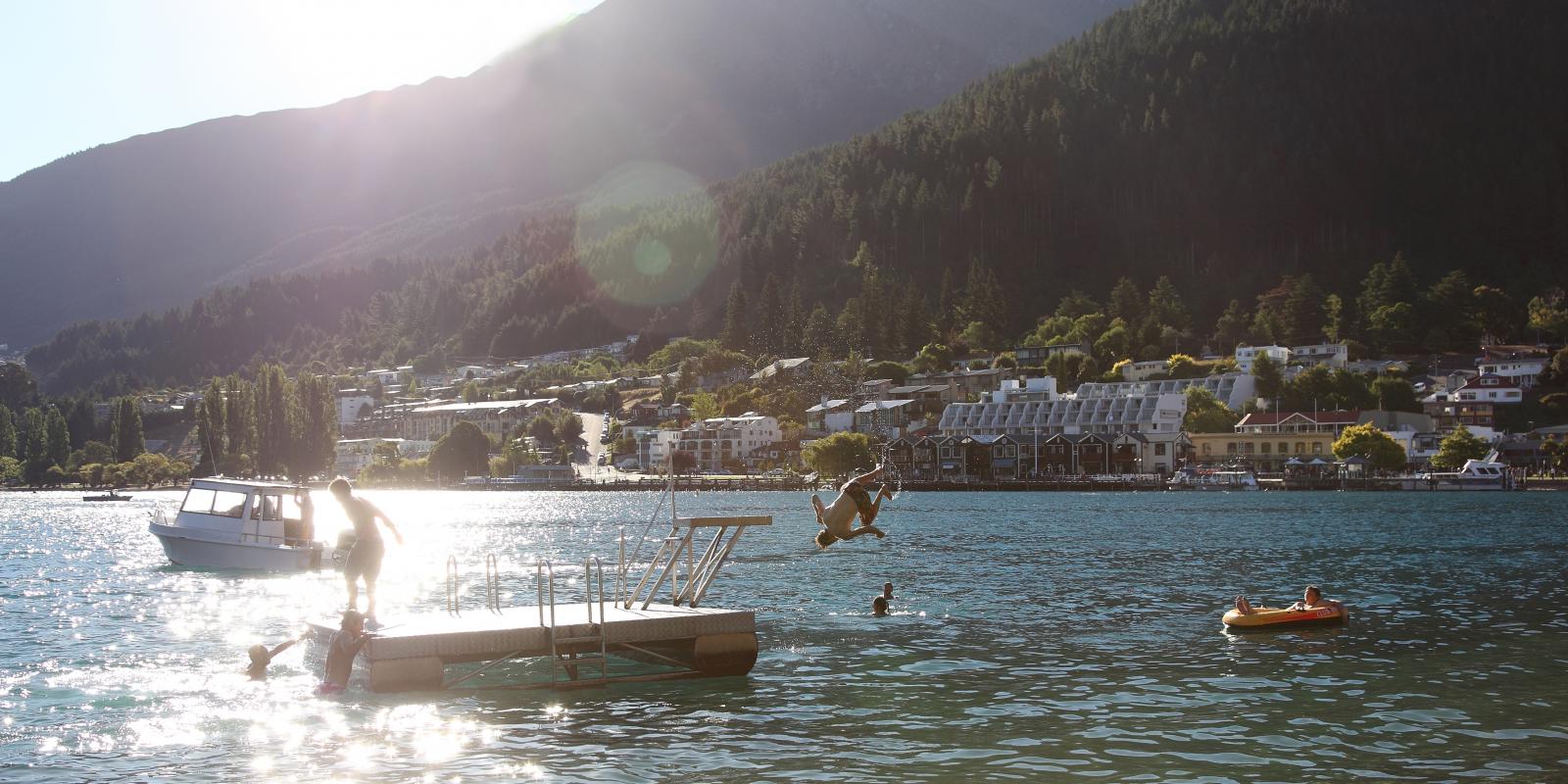 Swimmers in Queenstown Bay Swimmers in Queenstown Bay