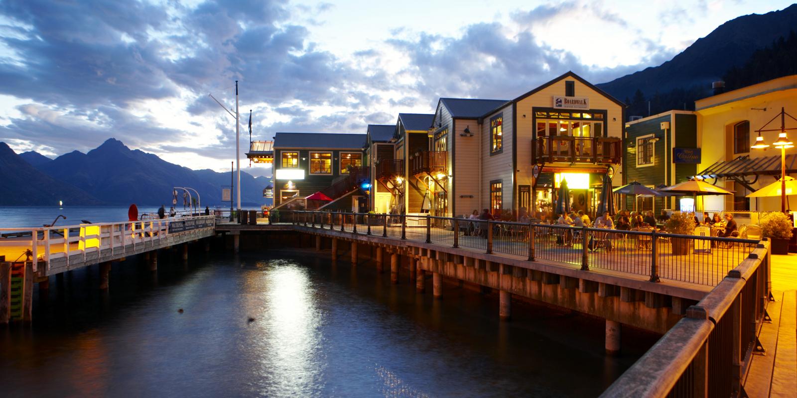 Steamer Wharf eateries at night, Queenstown Bay Steamer Wharf eateries at night, Queenstown Bay at dusk
