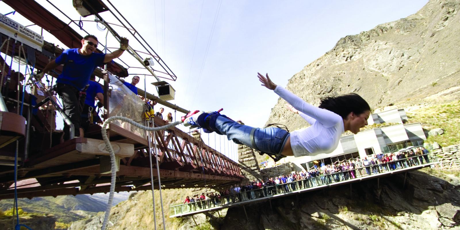 AJ Hackett Kawarau Bungy Woman jumping off the AJ Hackett Kawarau Bungy Bridge