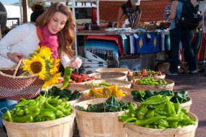 You can pick a basket of blossoms or a bushel of chiles at the Santa Fe Farmers’ Market. (Photo Credit: Santa Fe Sage Inn)