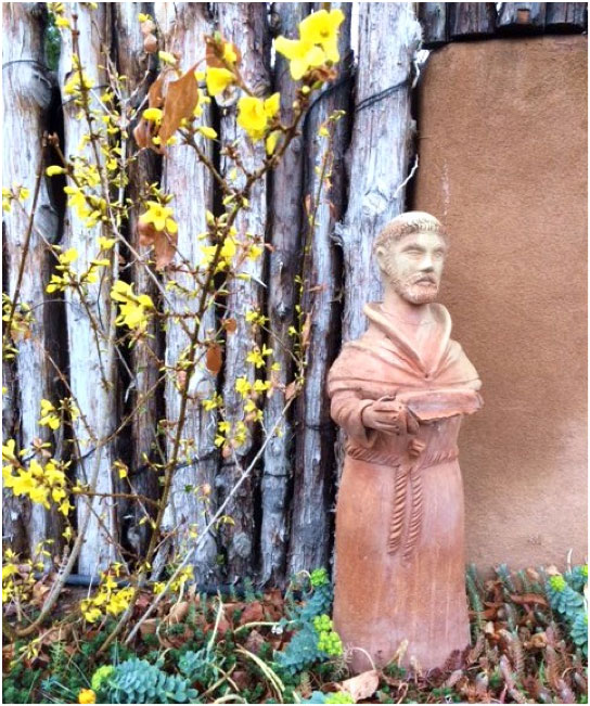 St. Francis, Santa Fe’s patron saint, knows that spring is a harbinger of Santa Fe’s Summer of Color.