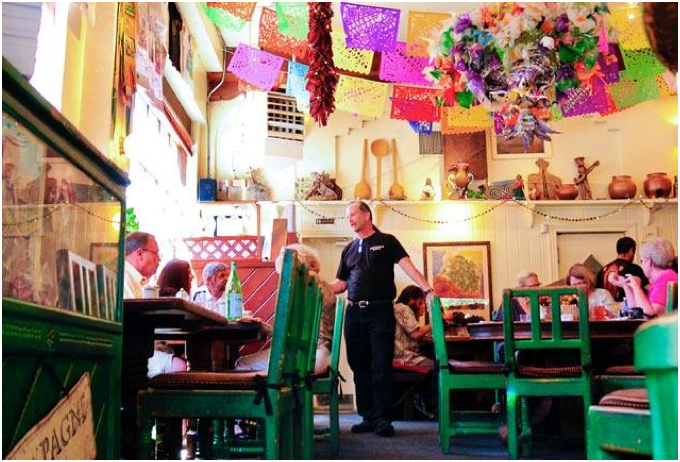 Café Pasqual is a delicious rainbow of colors overhead and on the plate. (Photo Credit: Café Pasqual)