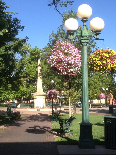 A bench on the Santa Fe Plaza is the locals’ choice for color and comfort.