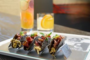 Chef John Rivera Sedlar puts an Eloisa twist on tacos by stuffing them with pastrami! (Photo Credit: Eloisa at the Drury Plaza Hotel)