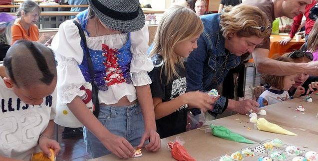 Children participate in sugar skull decorating at the Museum of International Folk Art.