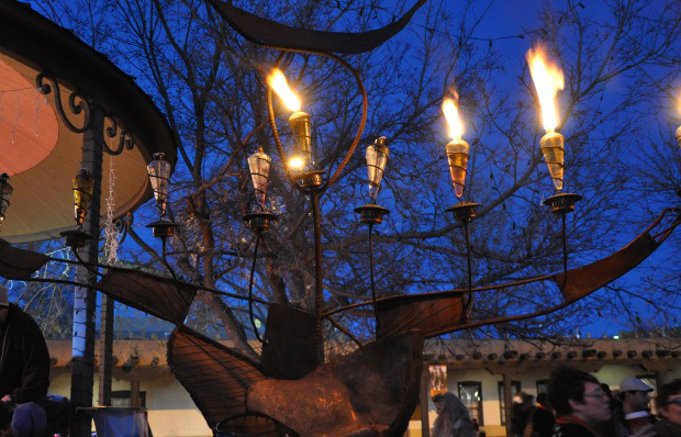 The menorah or Chanukah menorah (also known as a chanukiah) on each of the eight nights of Chanukah.