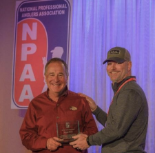 Johnny Morris receiving award from NPAA president Brian Bashore.