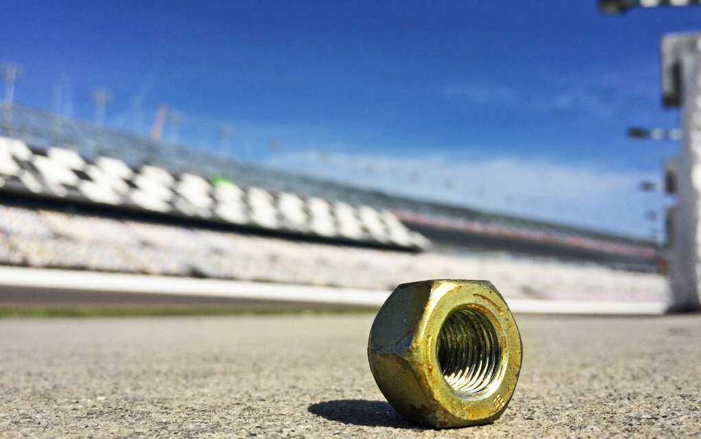 A lug nut sits in pit lane two weeks before the Daytona 500 in the recently renovated Daytona International Speedway. 