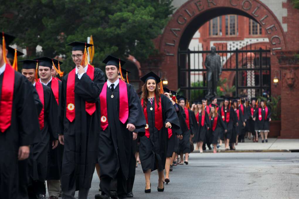 Flagler College students leave Ponce de Leon Hall for their commencement ceremony.