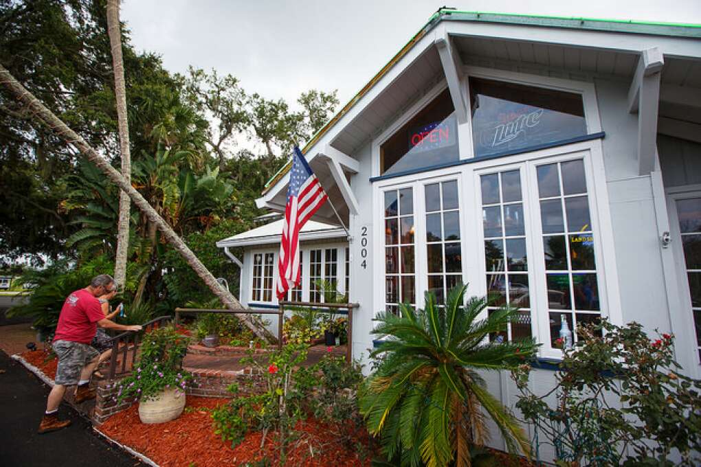 Customers head in to grab a table and a burger at Lost Lagoon Wings & Grill in New Smyrna Beach.