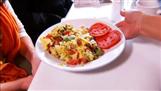 Omelette with two tomatoes