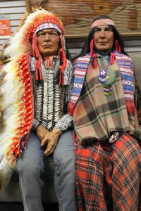 Native American figures once used as props for John Wayne movies.