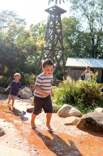 Children playing in the Australian Adventure Springs at the Fort Wayne Children's Zoo