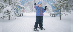 small child with snowshoes