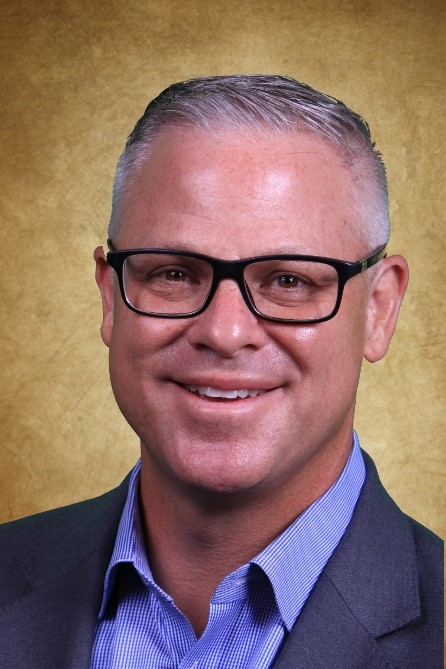 A person wearing glasses</p>
<p>Description automatically generated with low confidence