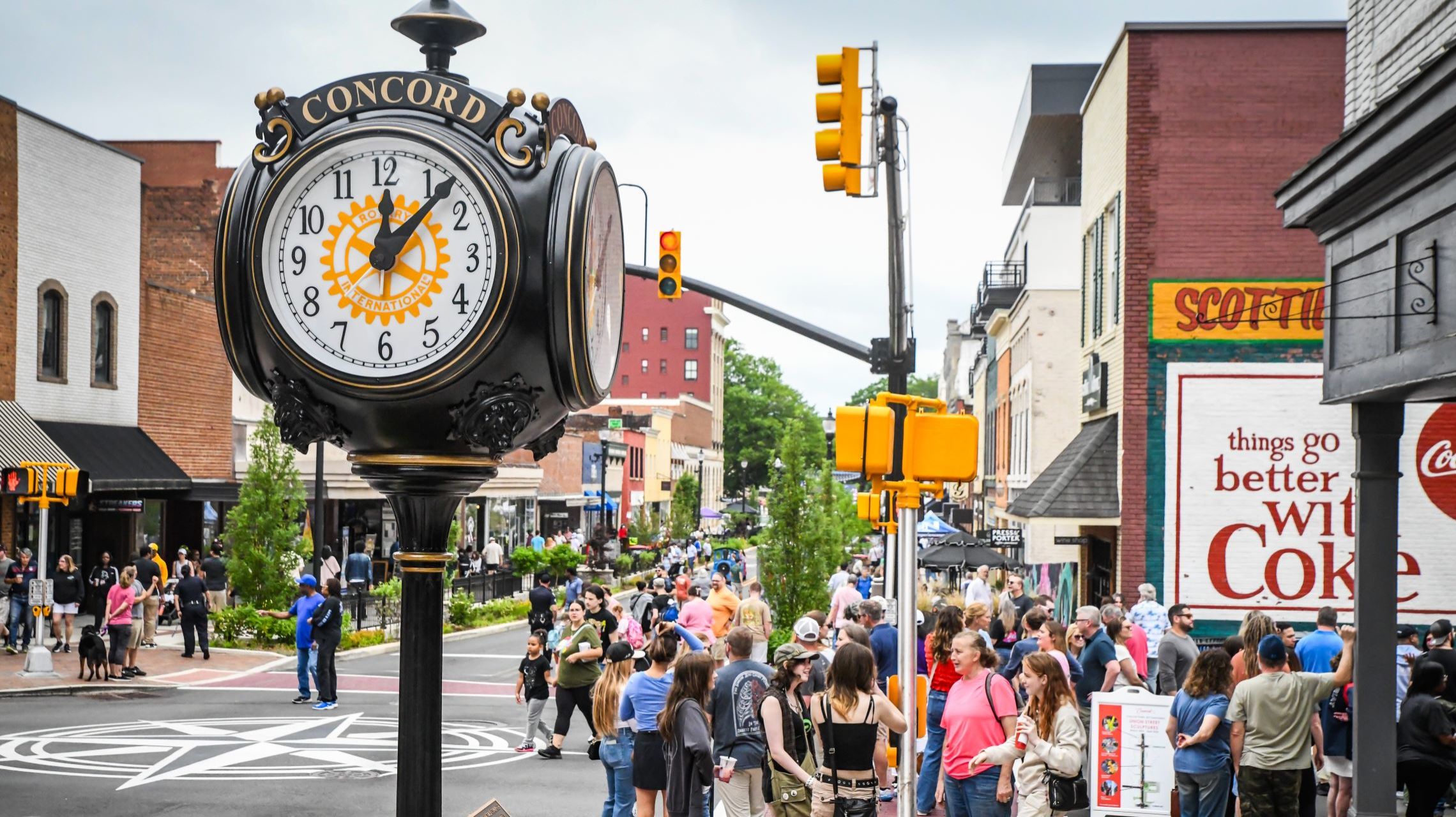 visitors fill the streets of historic downtown during an event