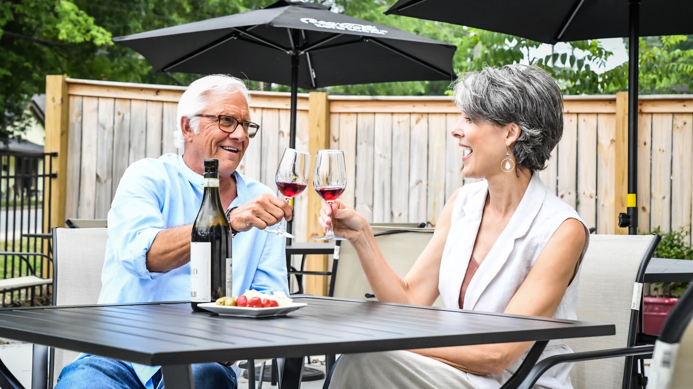 couple toast wine glasses