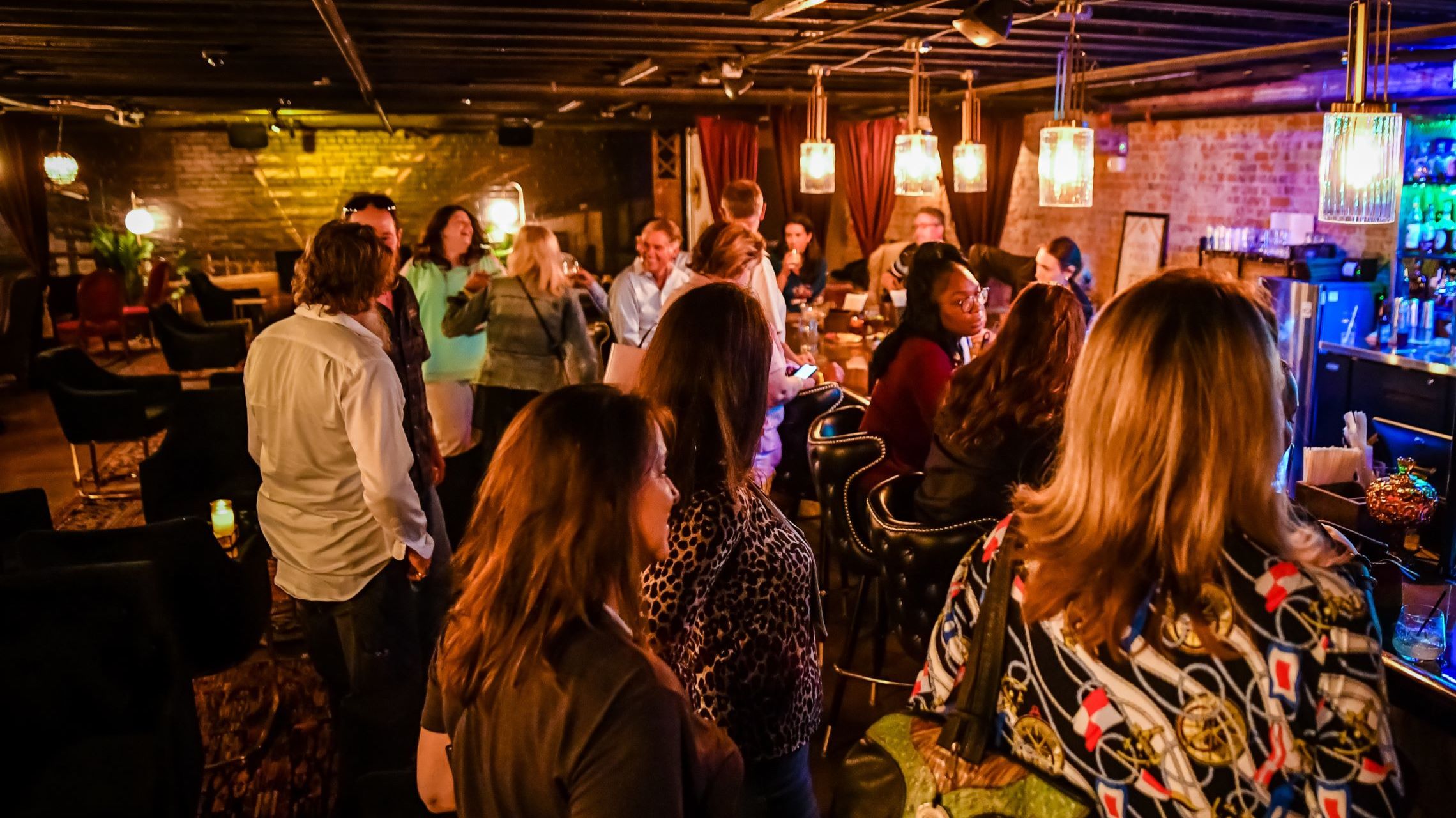 patrons inside speakeasy bar
