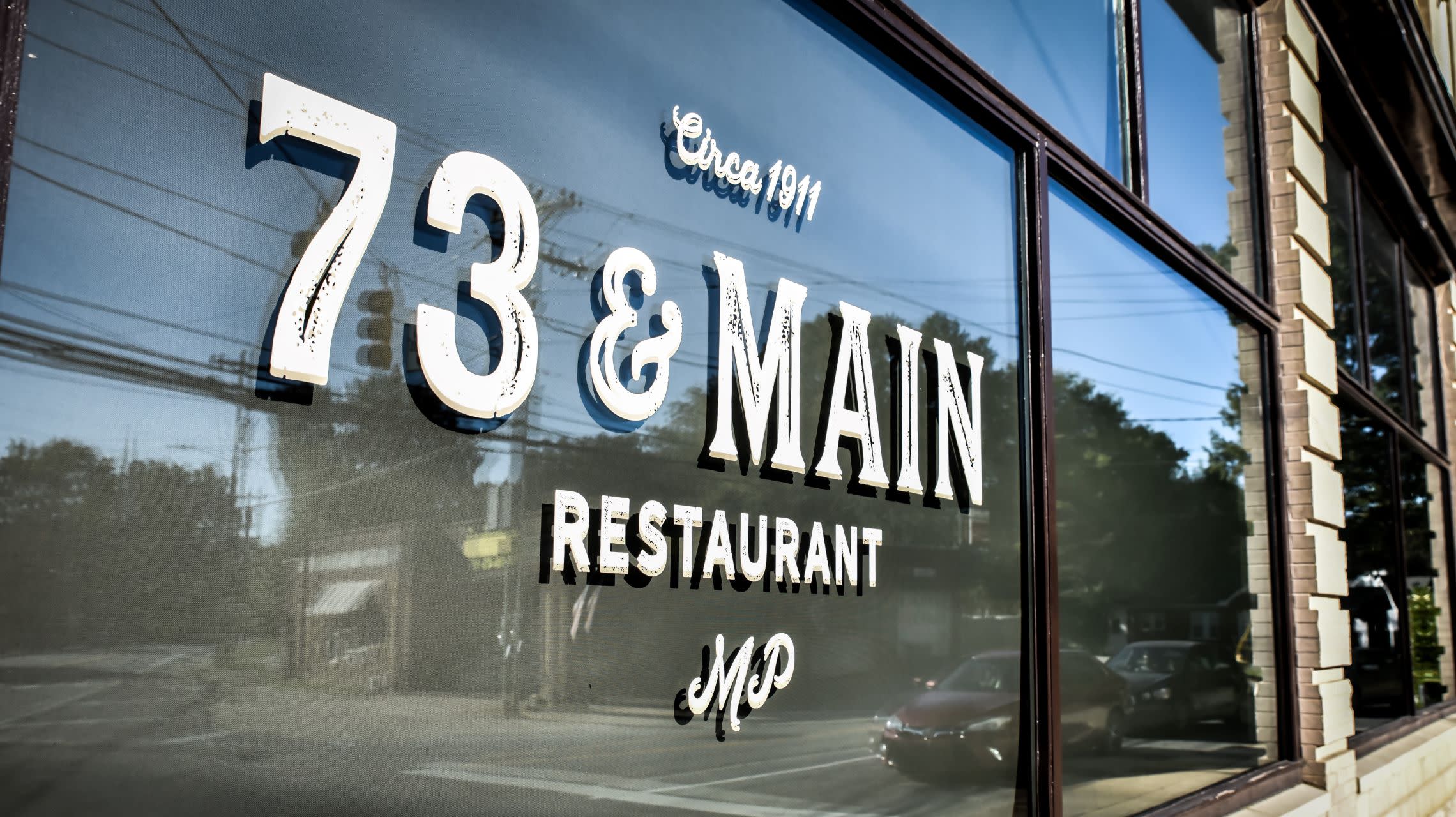 exterior window with restaurant name