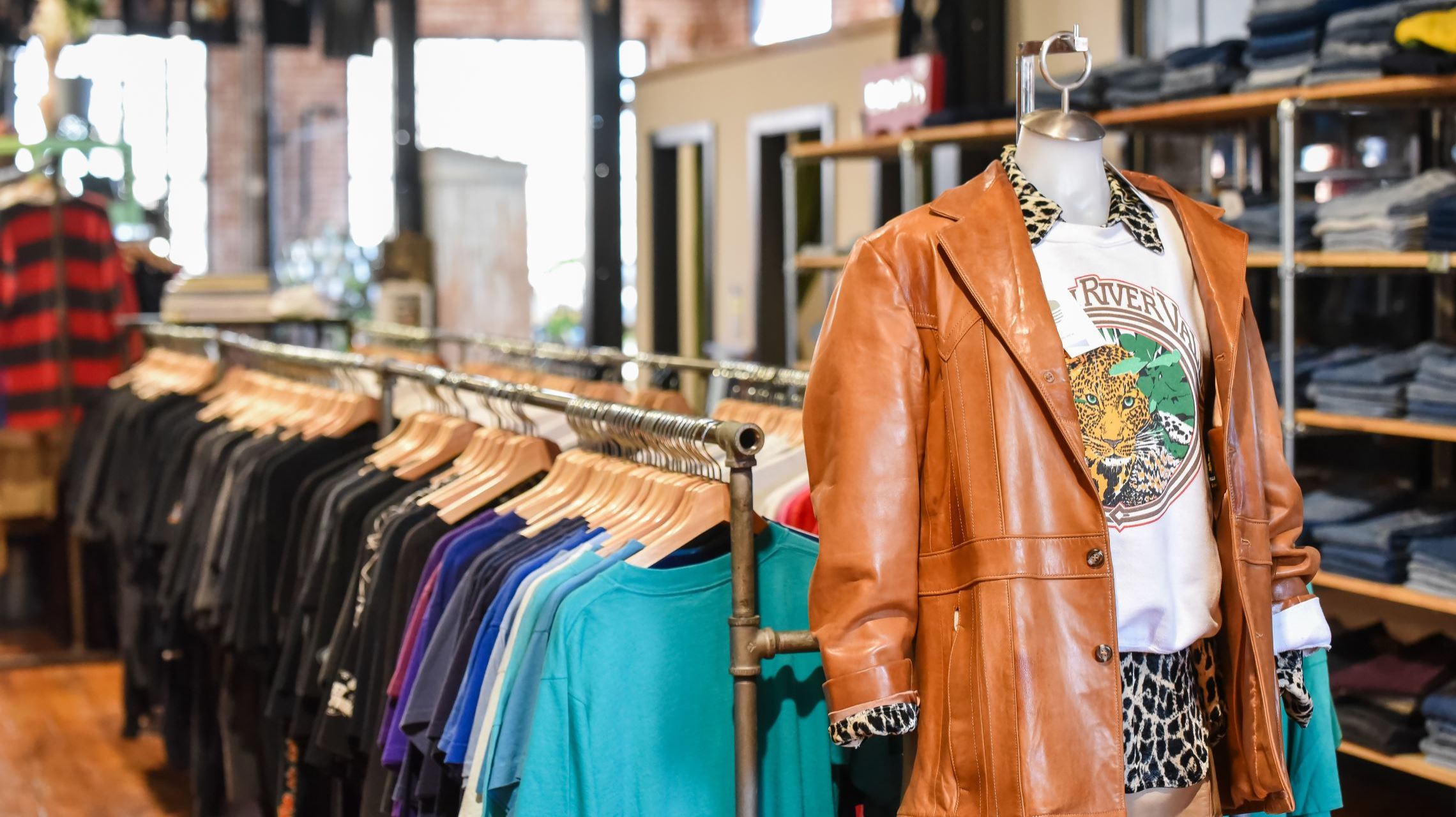 clothing on display inside vintage store