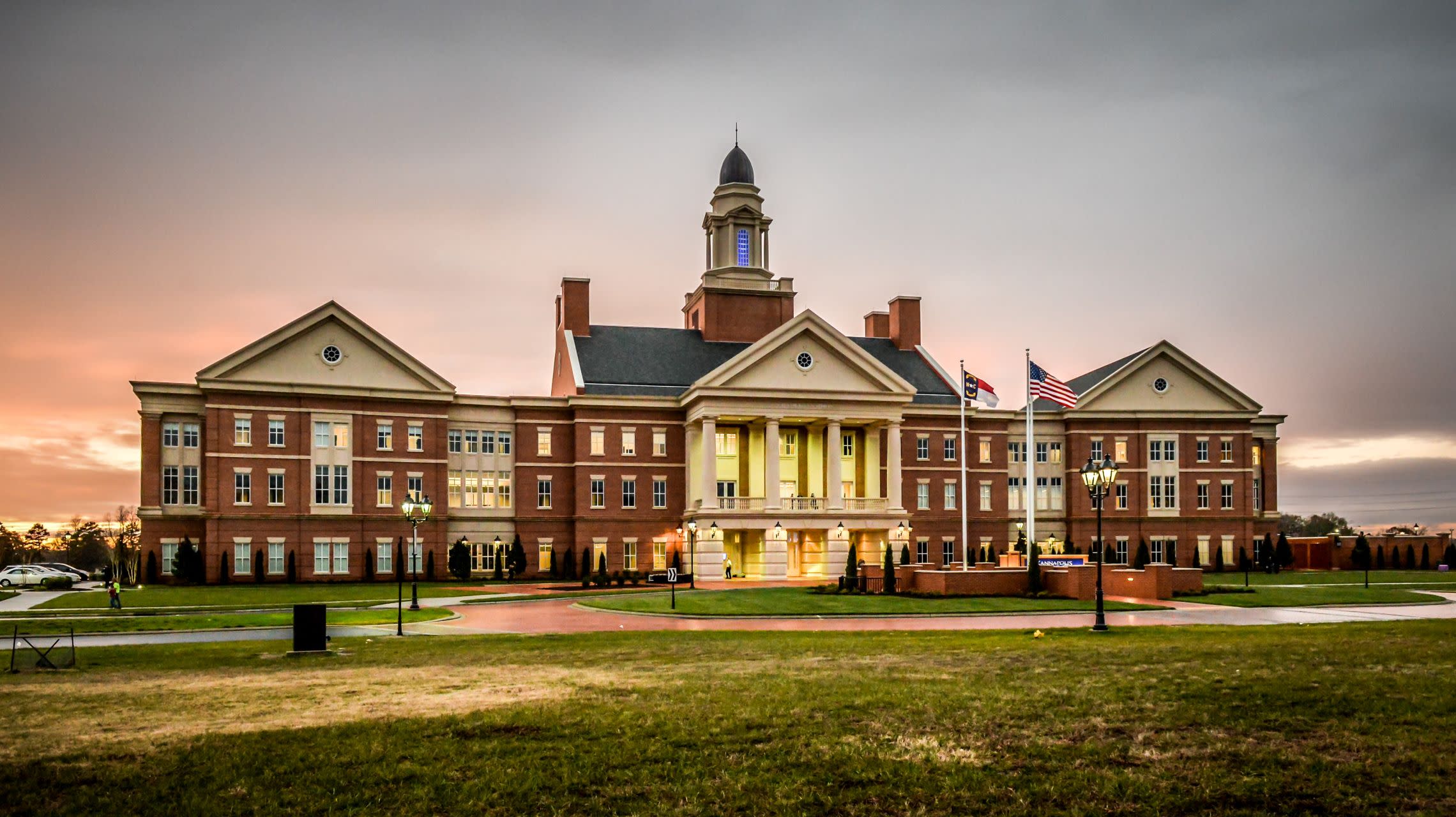 city hall building at sunset