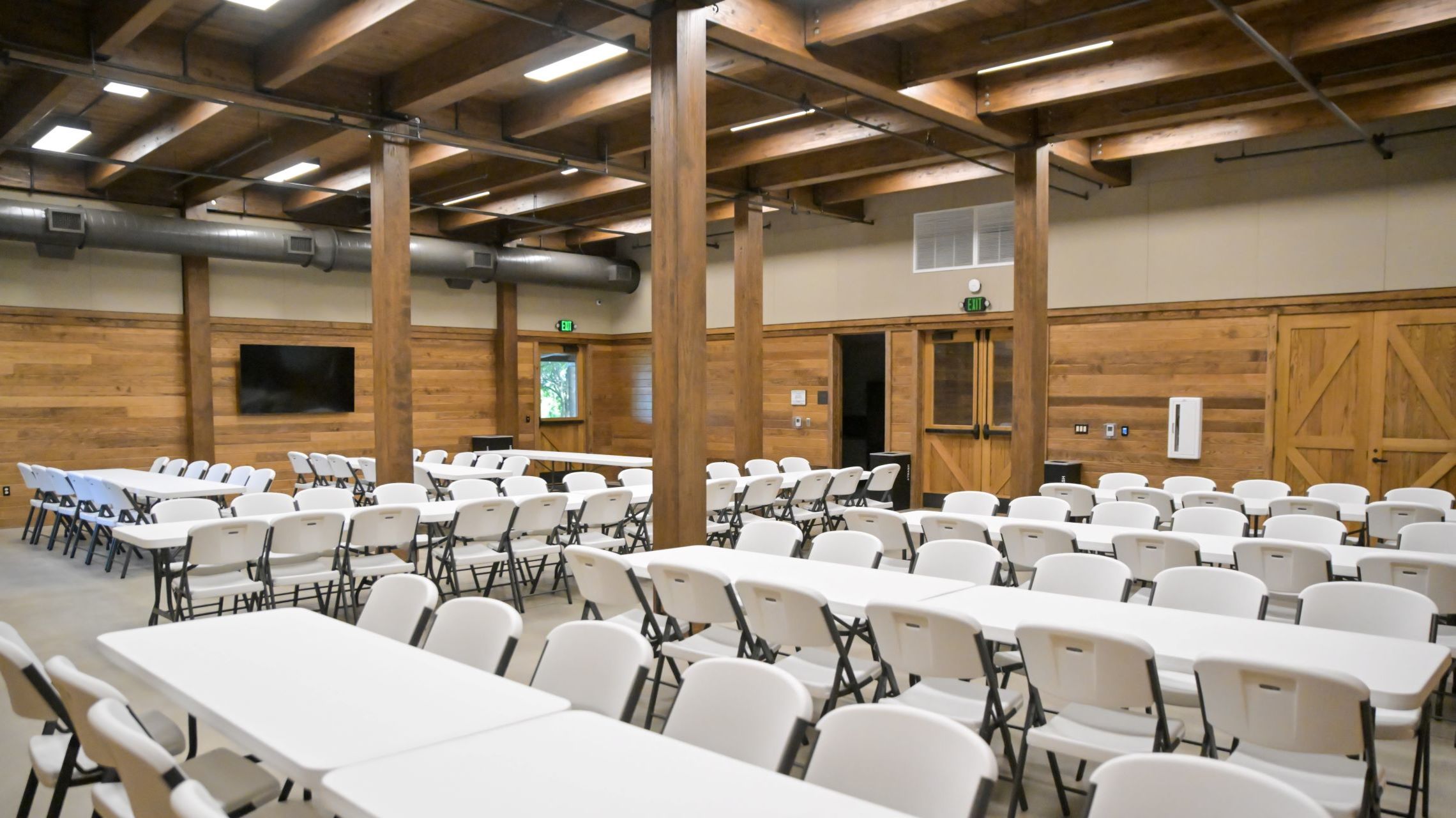 table and chairs set up in meeting space