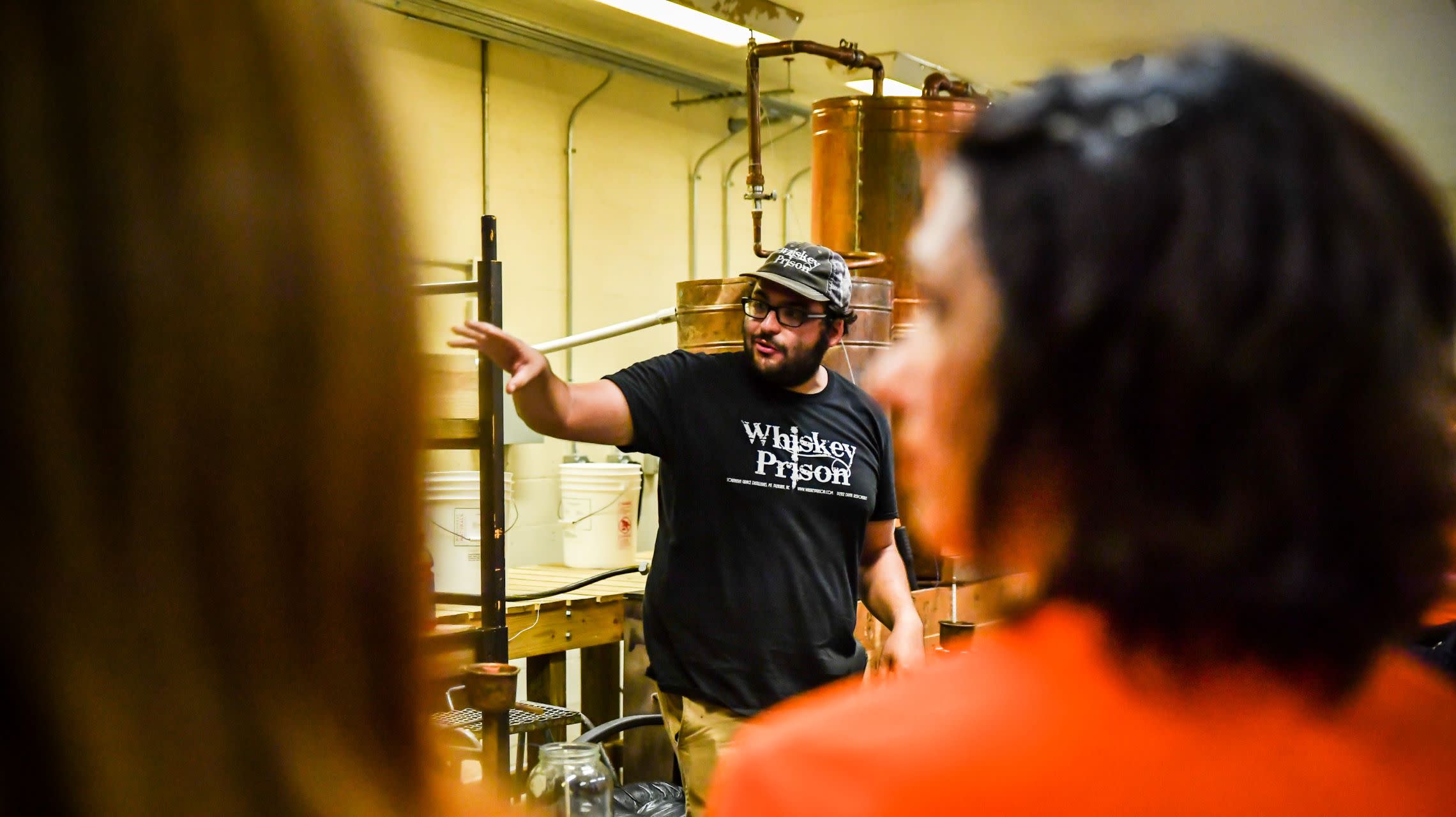 guides giving tour of distillery