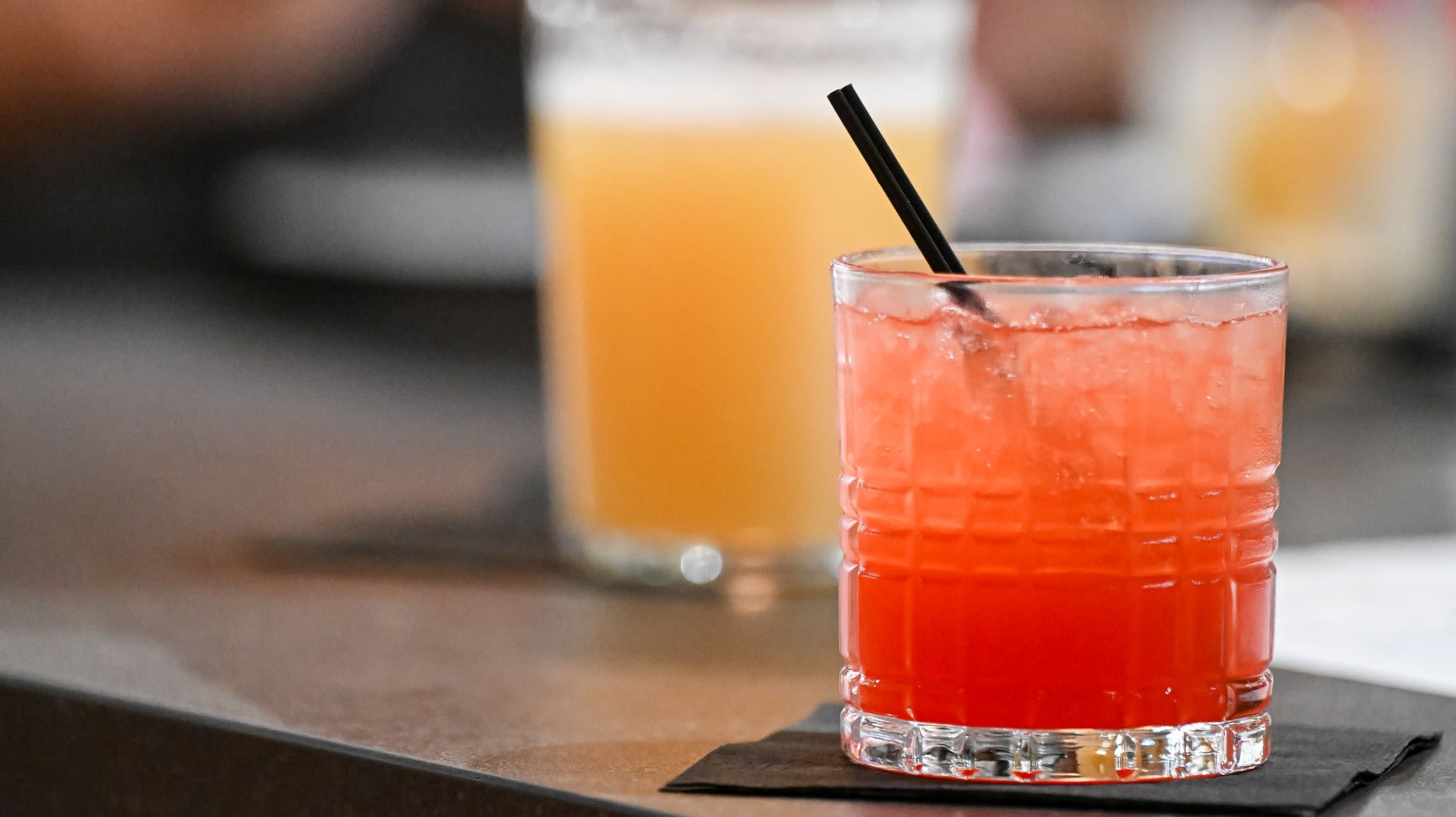 bourbon cocktail sitting on bar