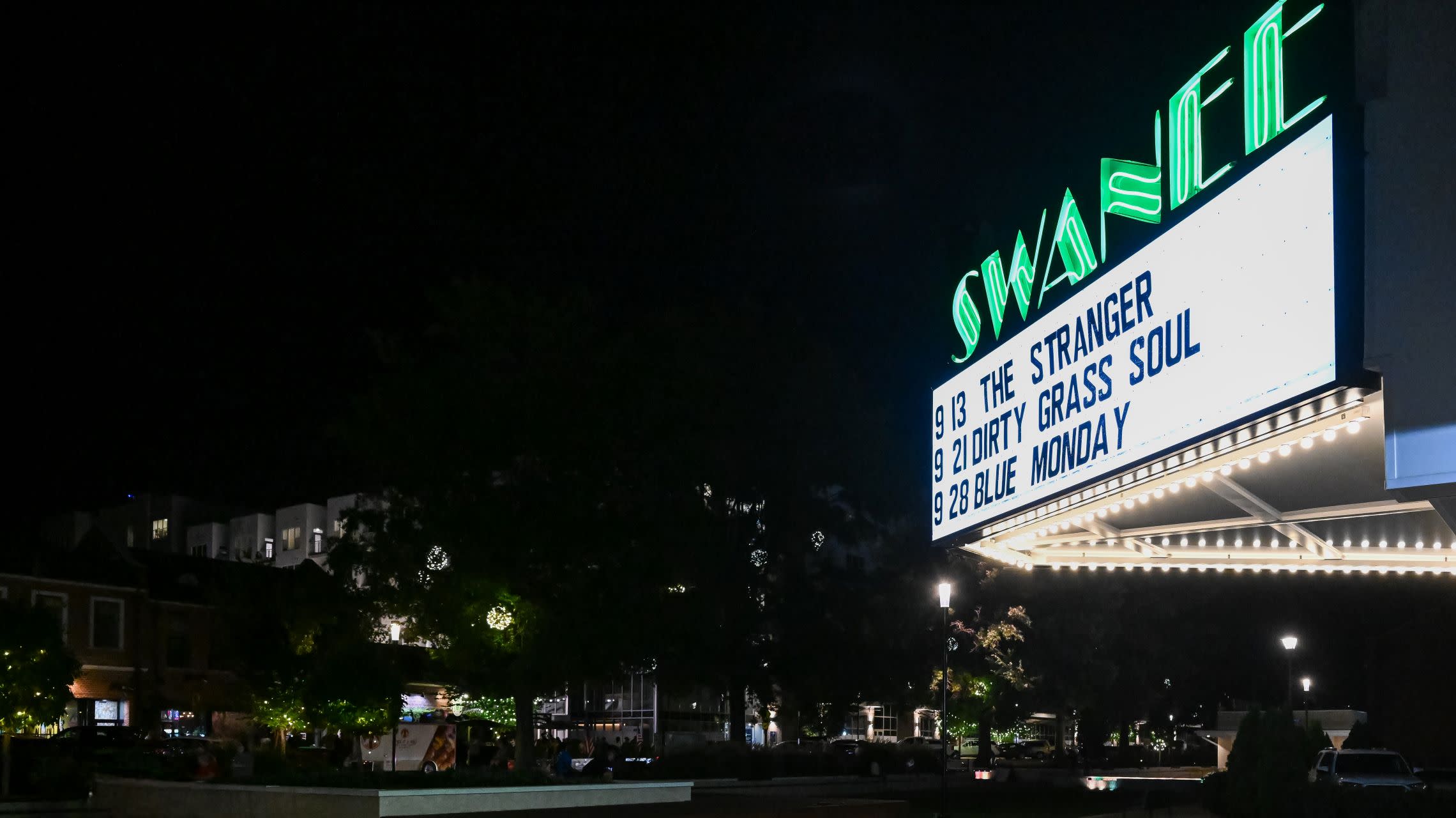 neon theater marquee at night