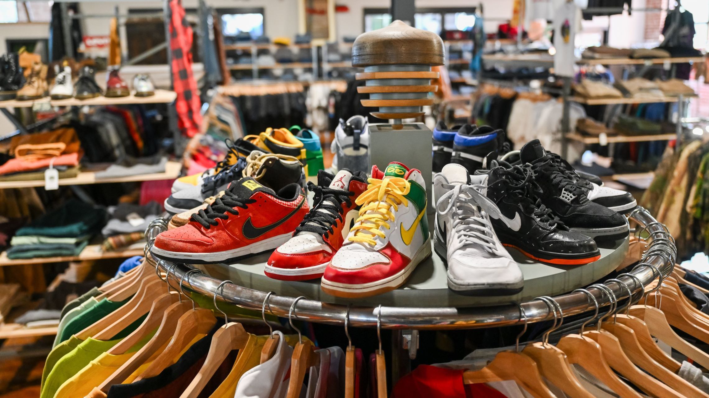 clothing and shoes on display inside vintage store