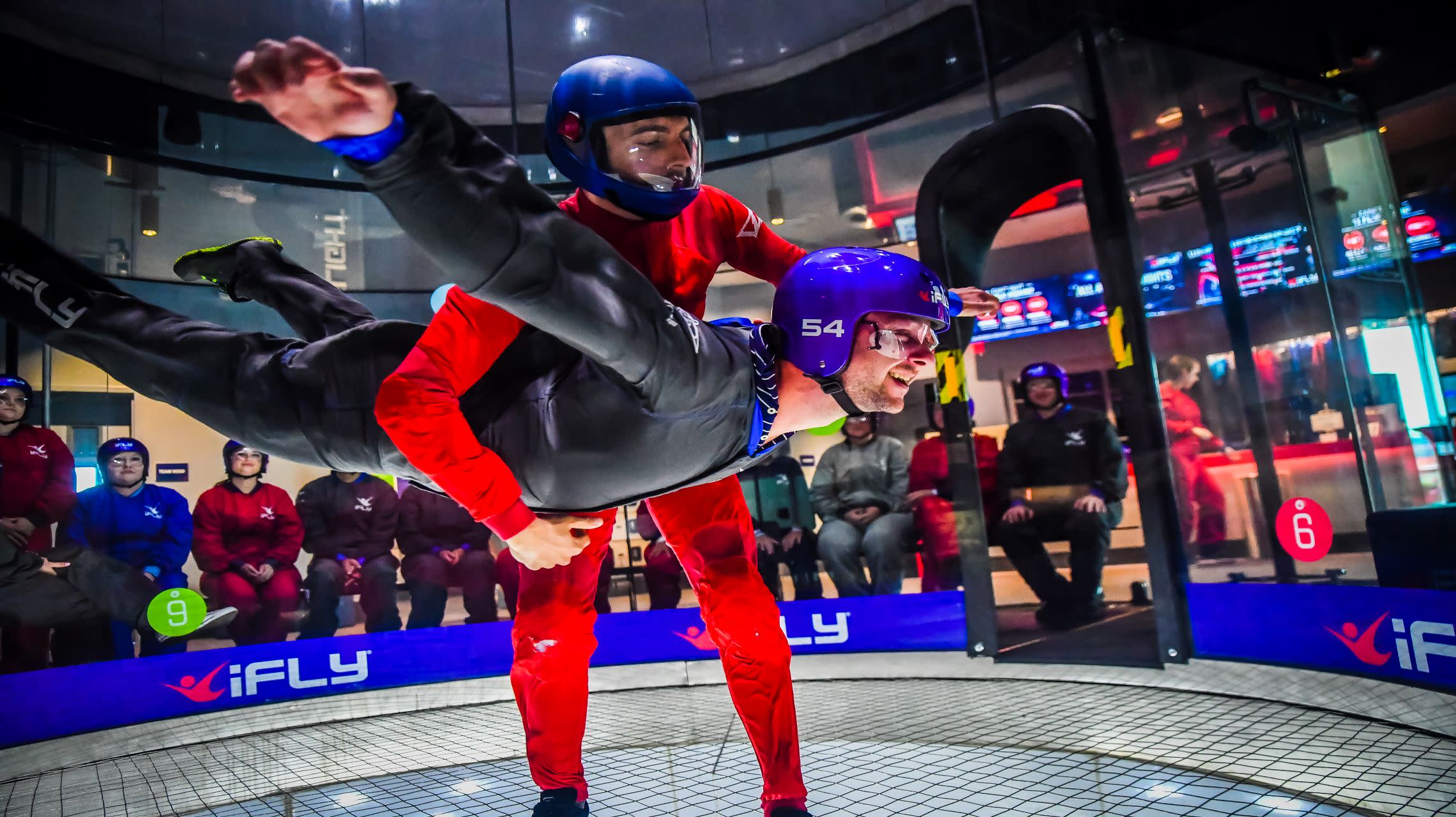 indoor skydiving participant with instructor