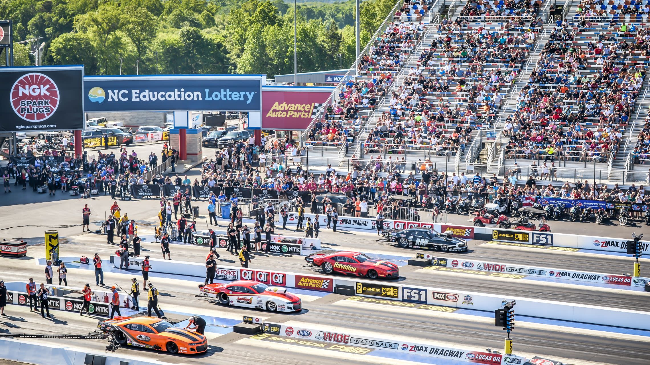 dragsters get set to race four-wide