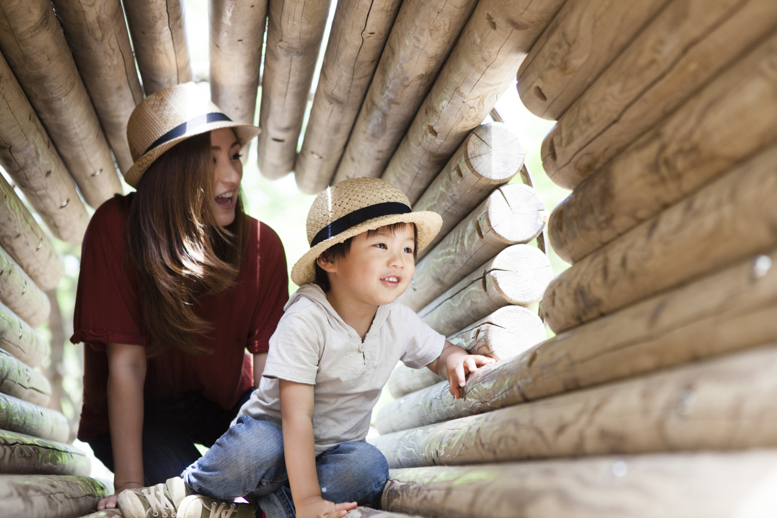 Mother Son Duo Inside a Log