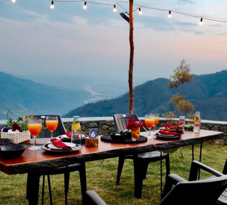 food laid out on a table at our Restaurant in Rishikesh