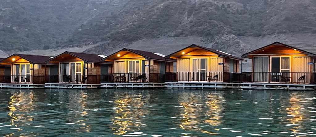 ariel and front view of the floating huts at Le ROI Floating Huts Eco Rooms captured during the day and at night10