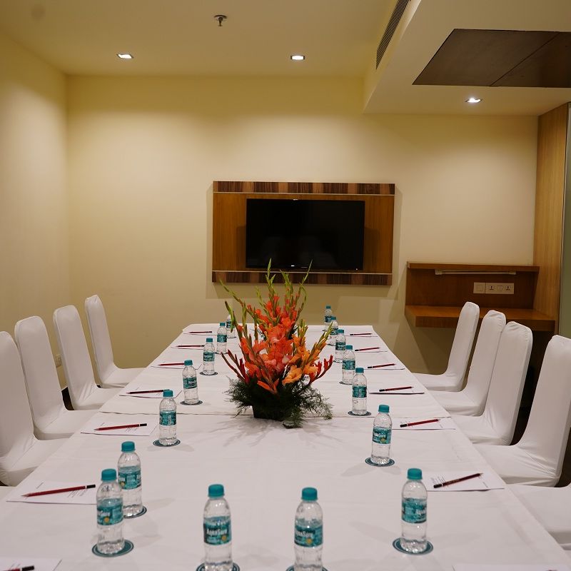 Board Room decked with table and chairs at Shervani Nehru Place, New Delhi