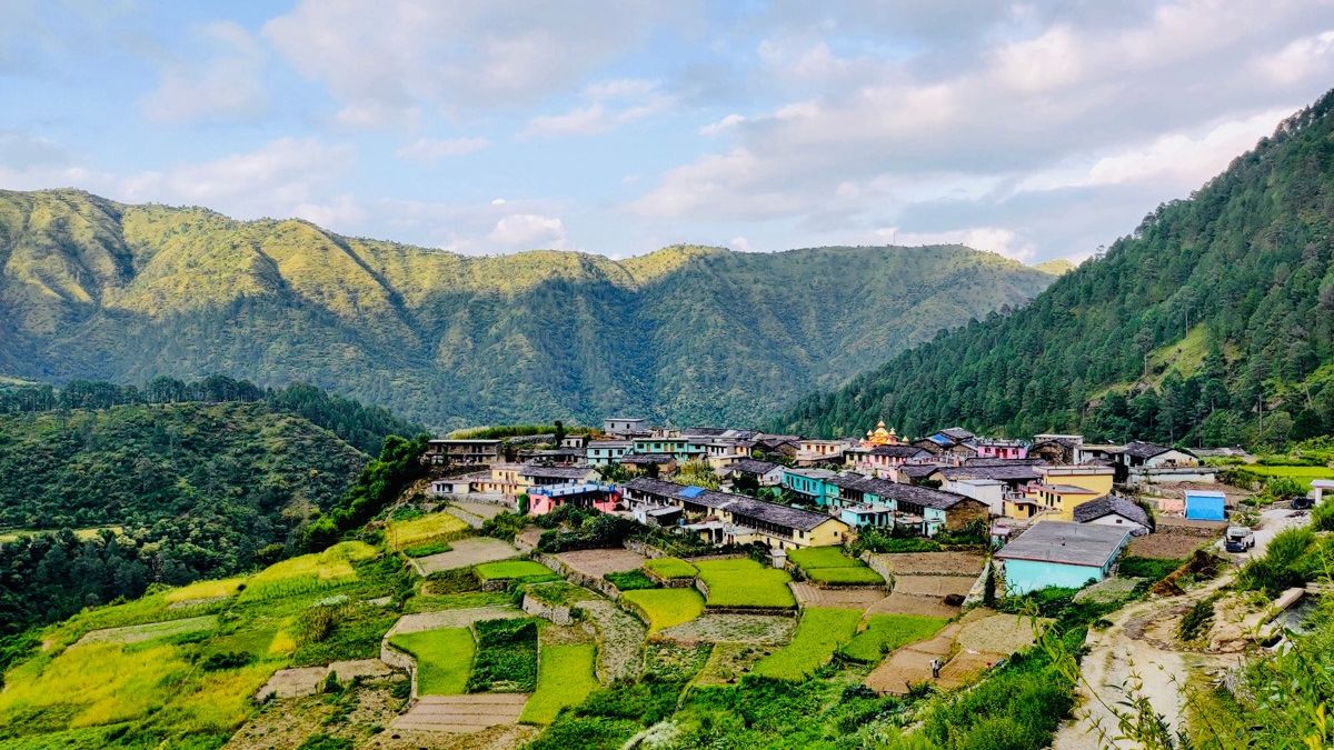 An aerial view of Kyari Village with amountain at the backdrop