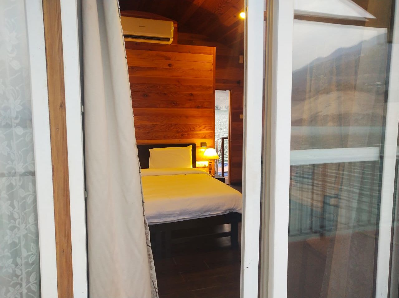 view of floating hut bedroom from outside - Le ROI Floating Huts Eco Rooms