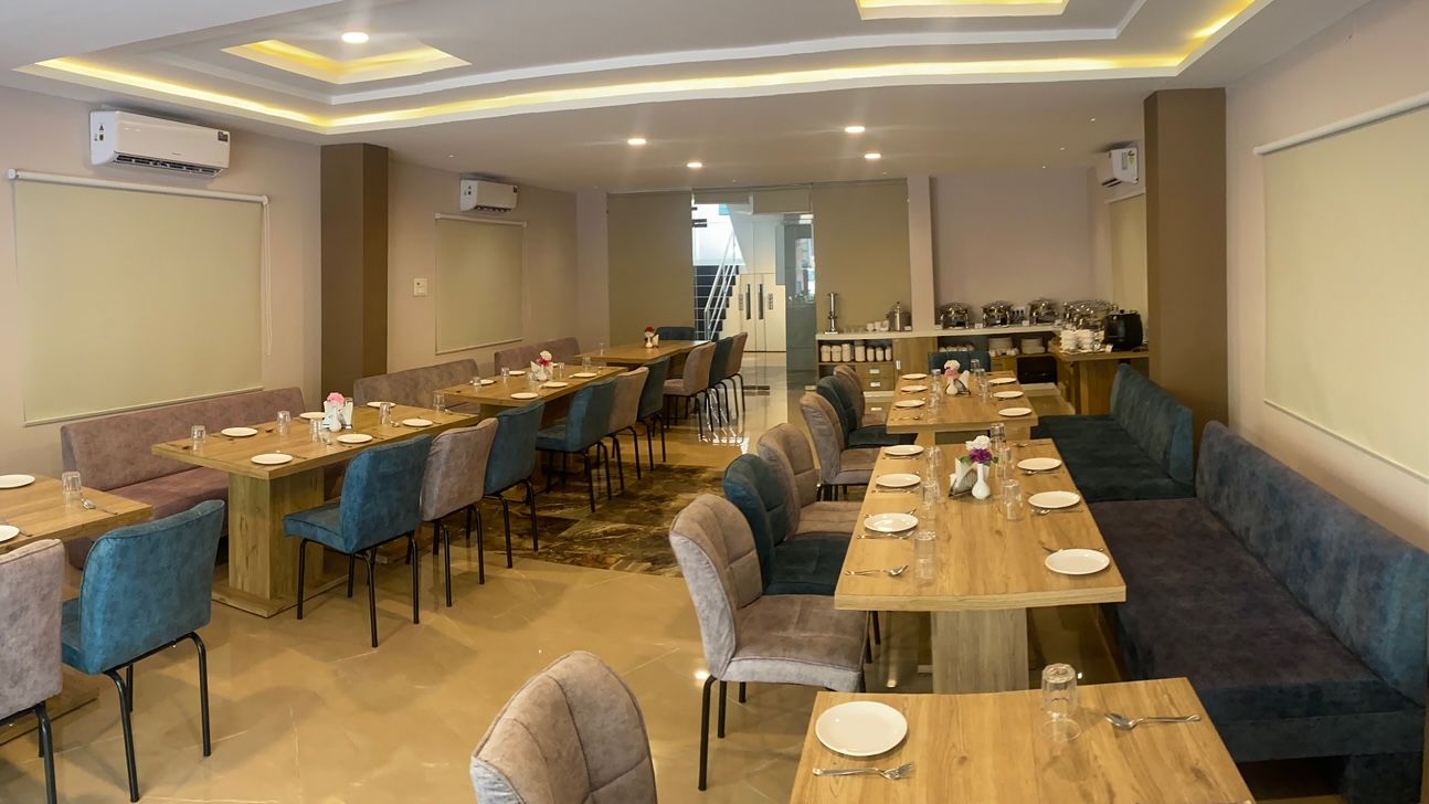 Wide angle view of dining room  at Hotel Mumbai House, Indore