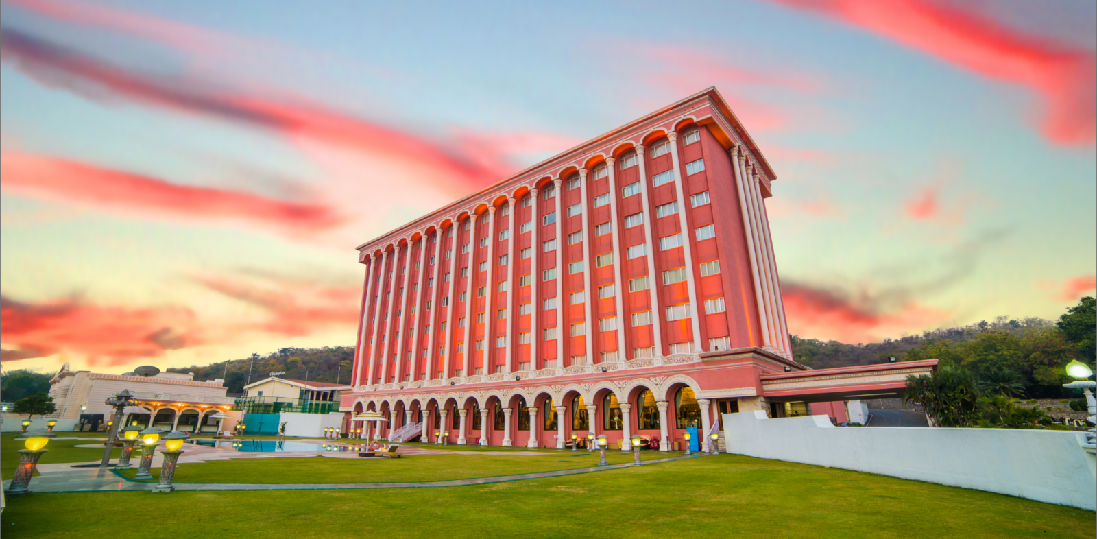 Facade of Sitara Luxury Hotel during the evening