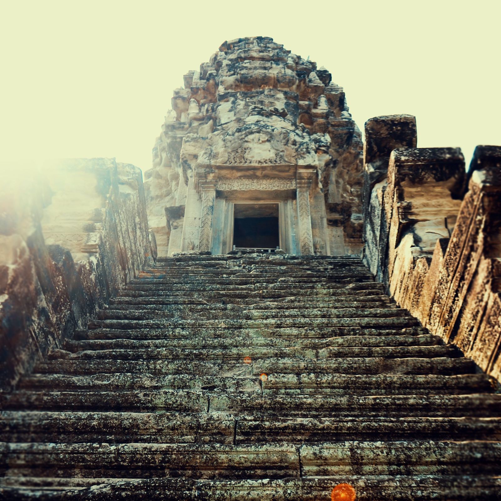 Facade of a stone cut temple during the day