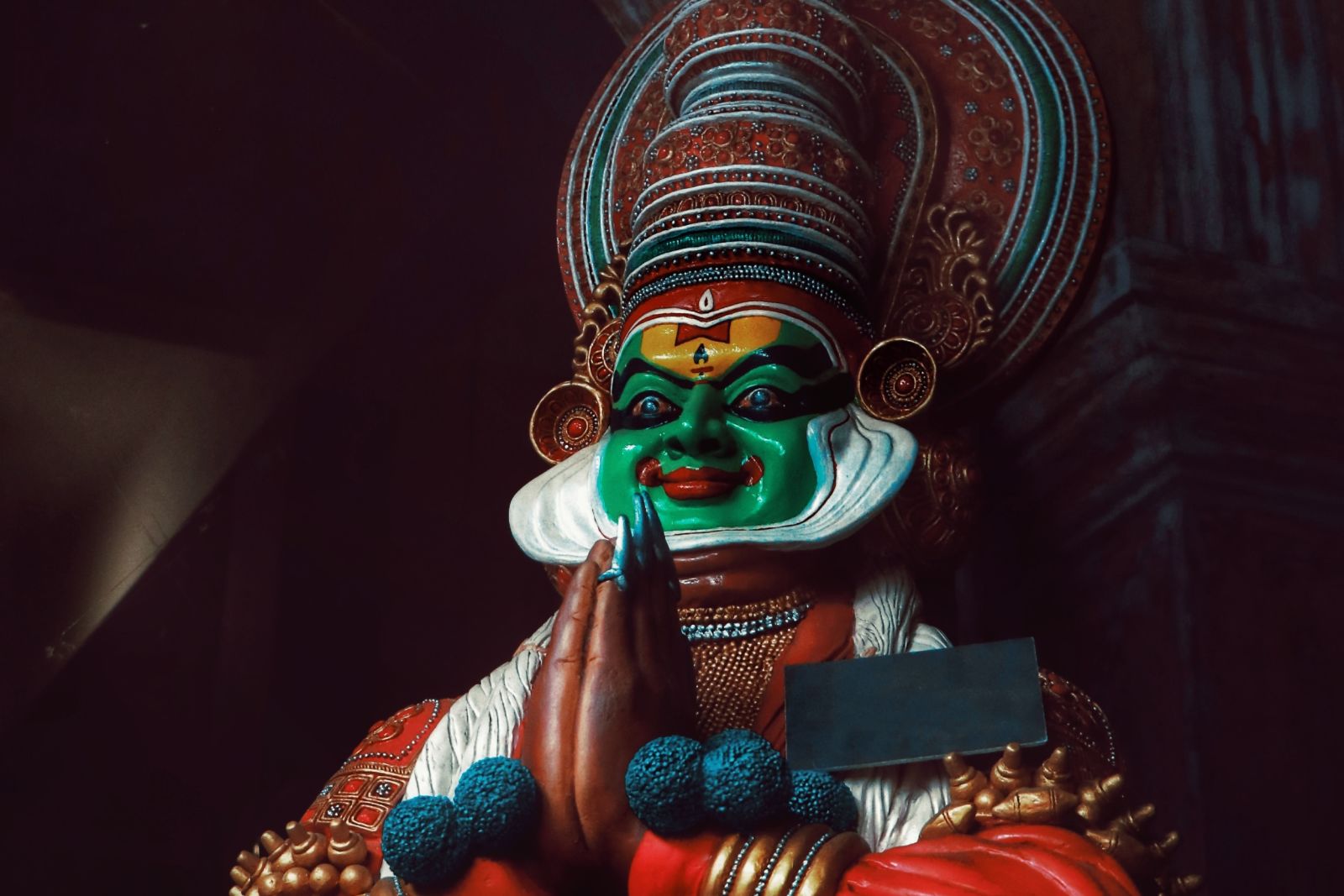 A person dressed to perform Kathakali - Kumarakom Tourism