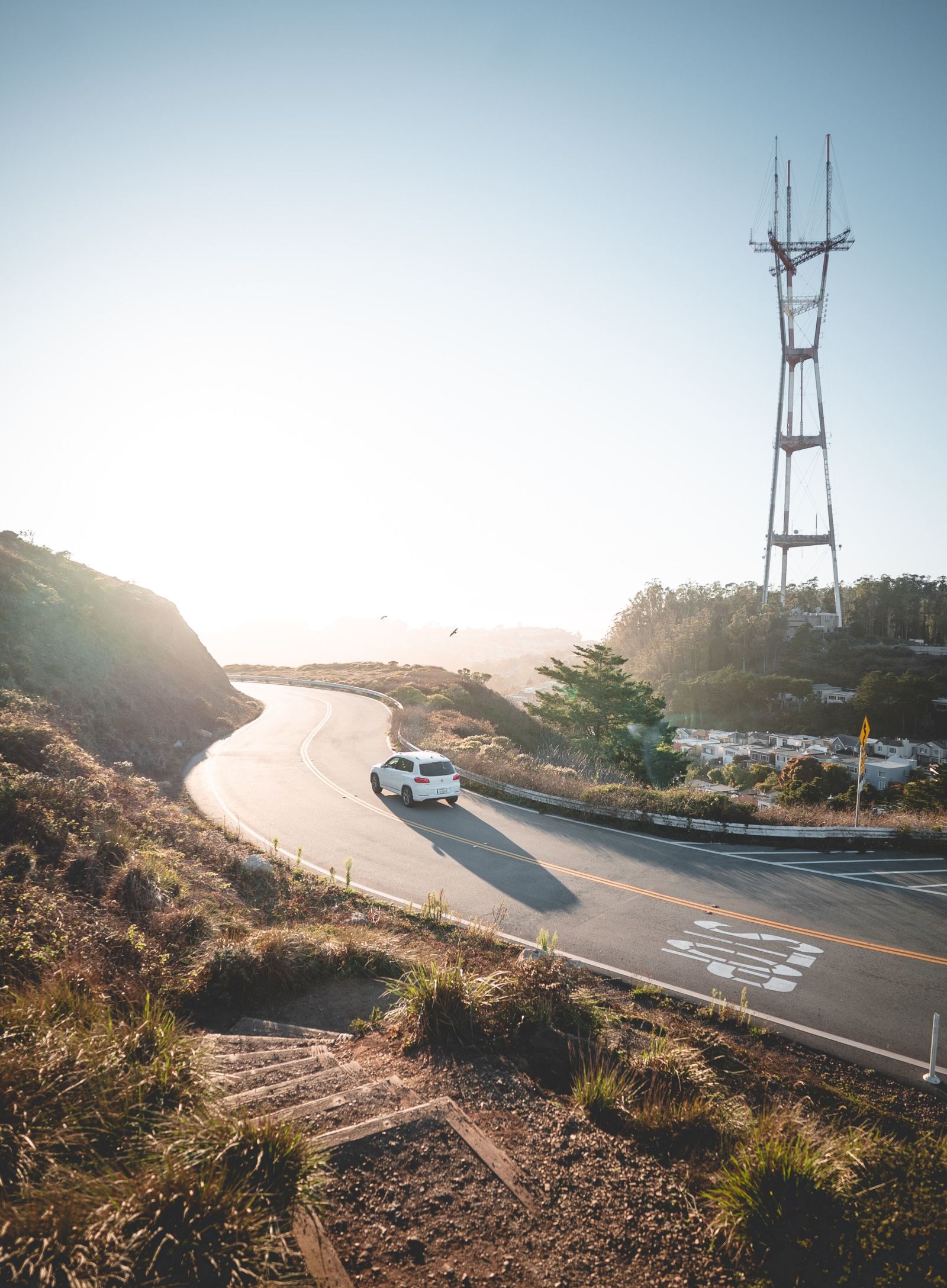 a car driving down a winding road